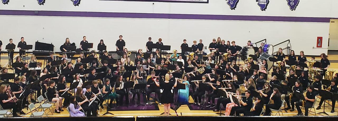 Middle & High school bands perform together